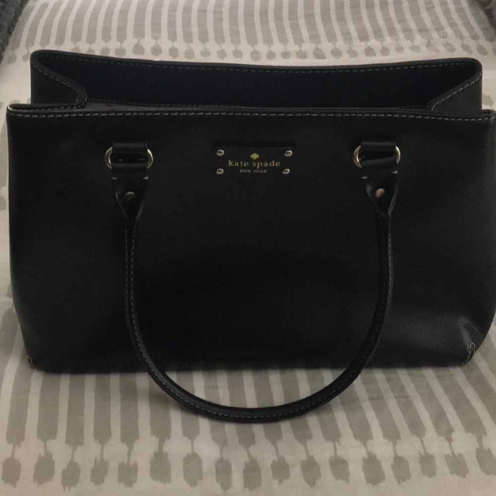 Kate spade black leather purse; used 2-3 times